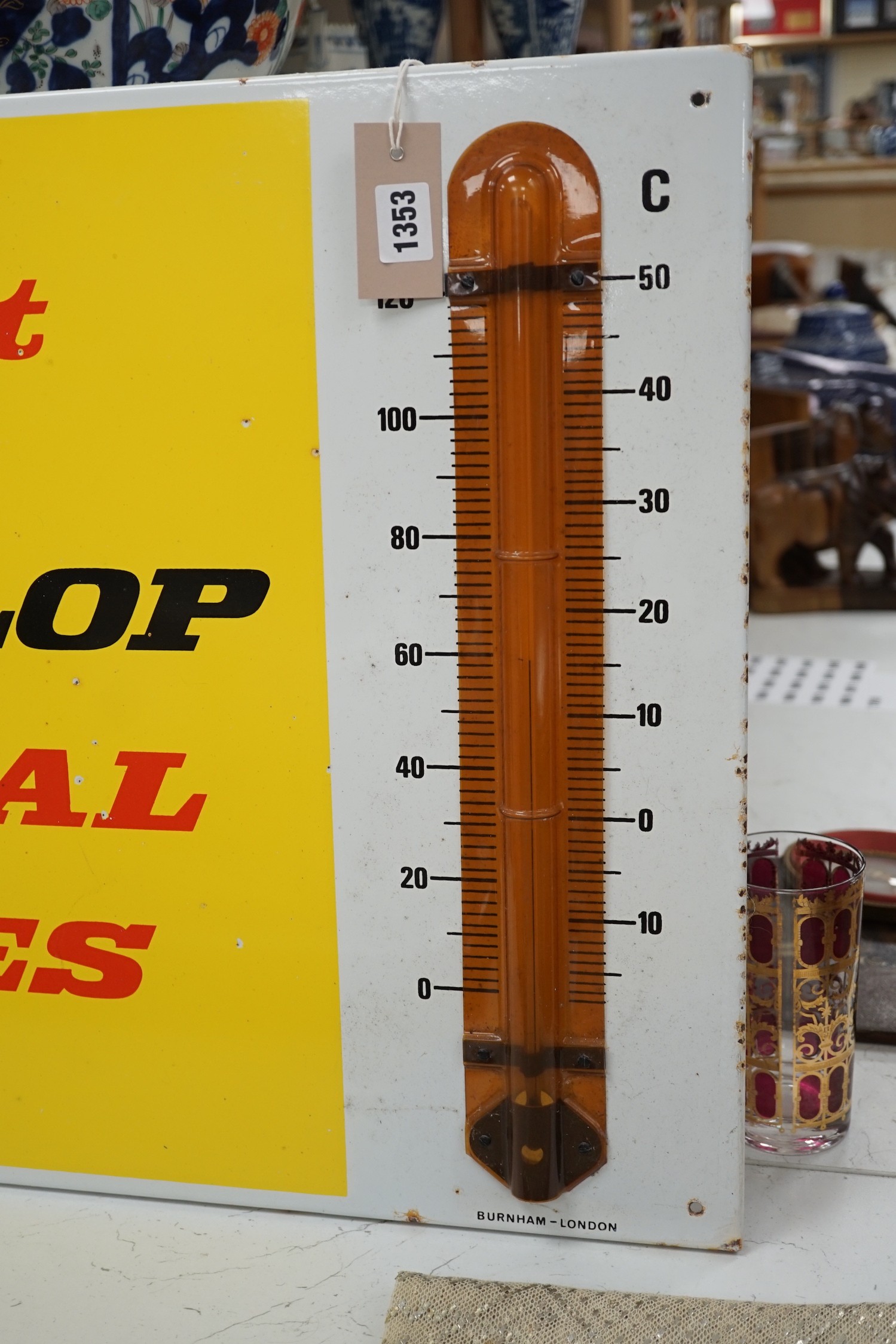 An enamel sign, Insist on Dunlop Radial Tyres, 66.5cms wide x 51cms high